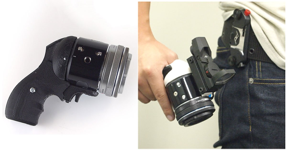 petapixel's tweet photo. This is a 3D-printed pistol grip for the Olympus Air: https://t.co/Xaqmk6NdM1 https://t.co/6Vcm67ccmI