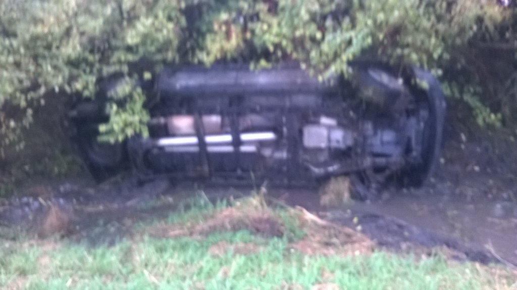 ksc93's tweet photo. I was the only one who stopped when this happened. Got wet and muddy and the driver is fine but scared 😓 https://t.co/eQfdDJSf2k