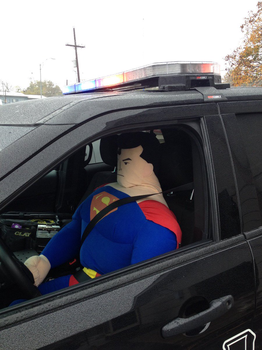 ClaycomoPD's tweet image. Superman stopped by to help fight crime and cheer on the KC Royals