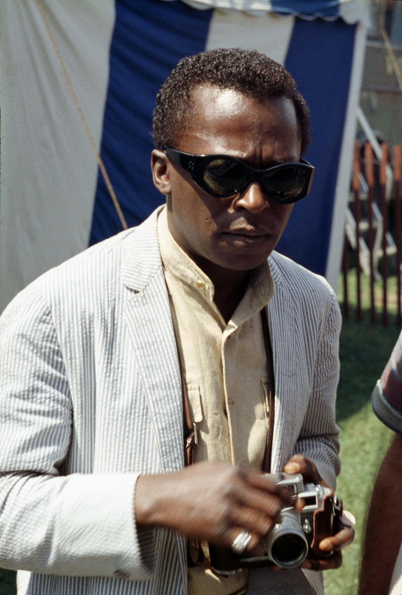 Ms_Golightly's tweet photo. #MilesDavis offstage at the @NewportJazzFest in 1969. Photo by #VernonLSmith https://t.co/8PRiAY2QU1