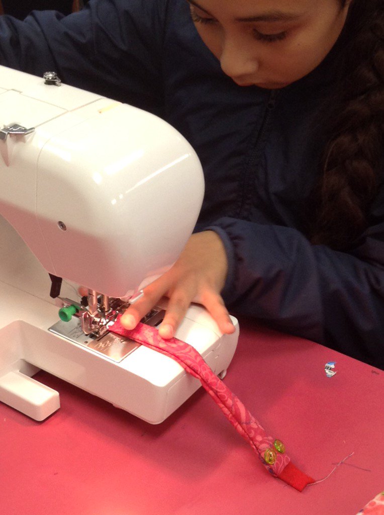 LStevensES's tweet image. Today's lesson is on threading a machine. Students completed their first project...a snake.