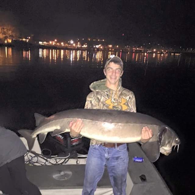 Fishesota's tweet photo. Hey guys, here is a pic of Fishesotas field staffer Devin Donaho with a MN state record sturgeon, 77" aprox 140lbs https://t.co/2p7yzpjDm9