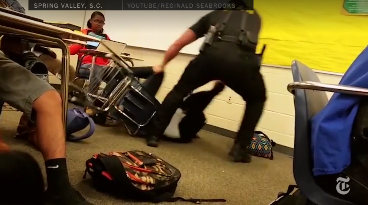 nytimes's tweet photo. The S.C. police officer who flipped a girl out of her desk got mixed reviews from students https://t.co/mRTOhYoth5 https://t.co/SD1YJo6RSr