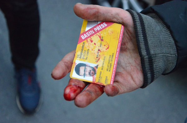 Press ID card of daily <a href="/gazetemillet/">Millet Gazetesi</a> journo was stained by blood after police brutality against journos in #Turkey