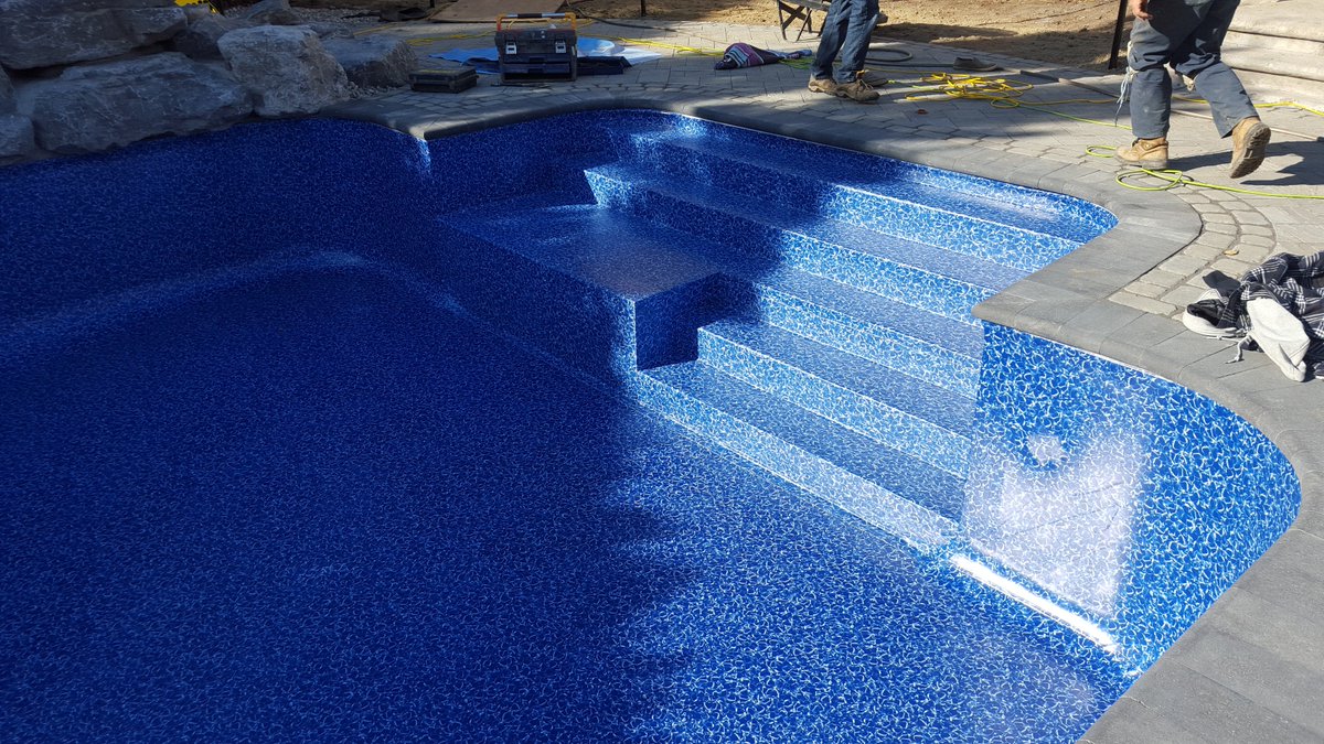 Vinyl liner over stairs, built on site for best possible fit. <a href="/PoolWerxInc/">PoolWerx Inc.</a> <a href="/cgtower/">CGT Ltd.</a> Aquarius pale blue