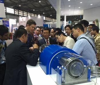 SKFgroup's tweet photo. Interested visitors discussing SKF Insight™ -  intelligent wireless technology integrated into our bearings #PTCASIA https://t.co/NMCtoJBmgv