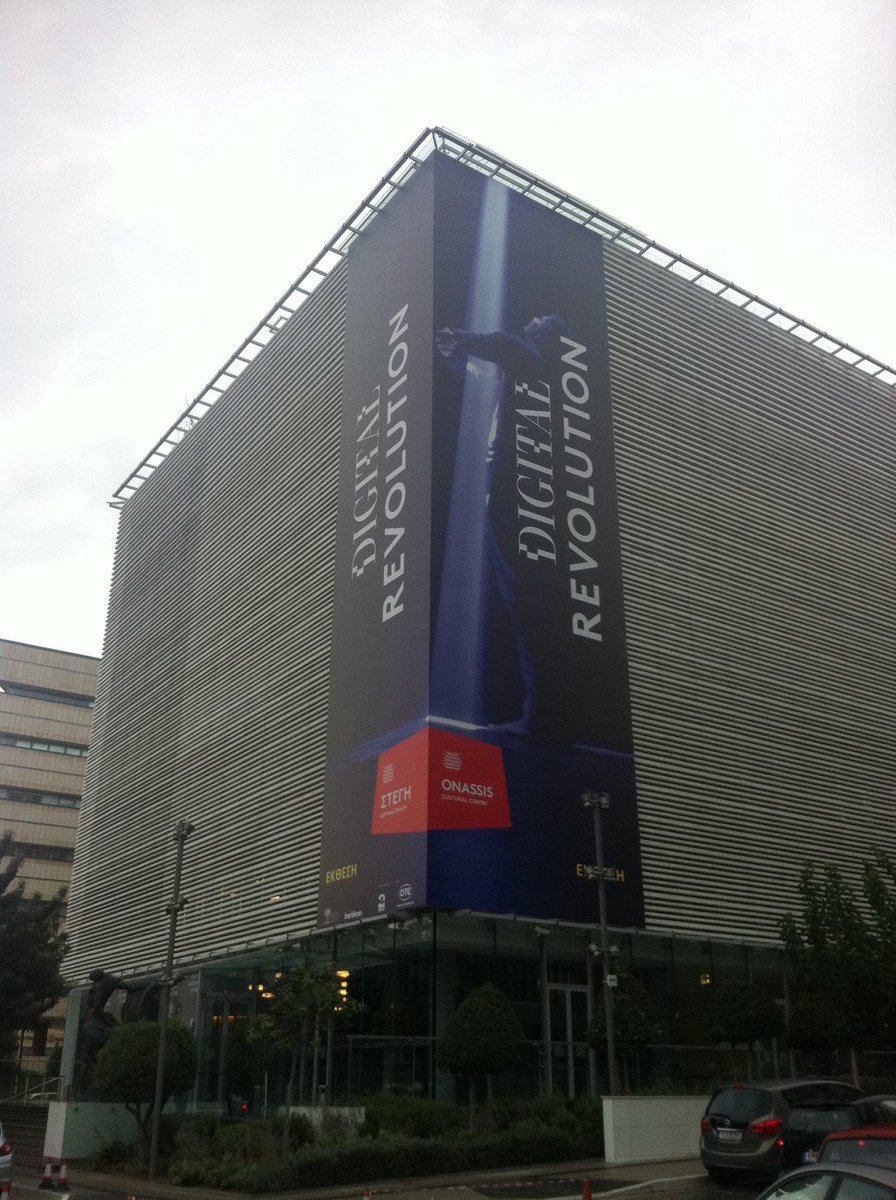 umbrellium's tweet image. Look who is on the side of the museum! Goodness, a very large image of #Assemblance @Stegi_occ @BarbicanCentre