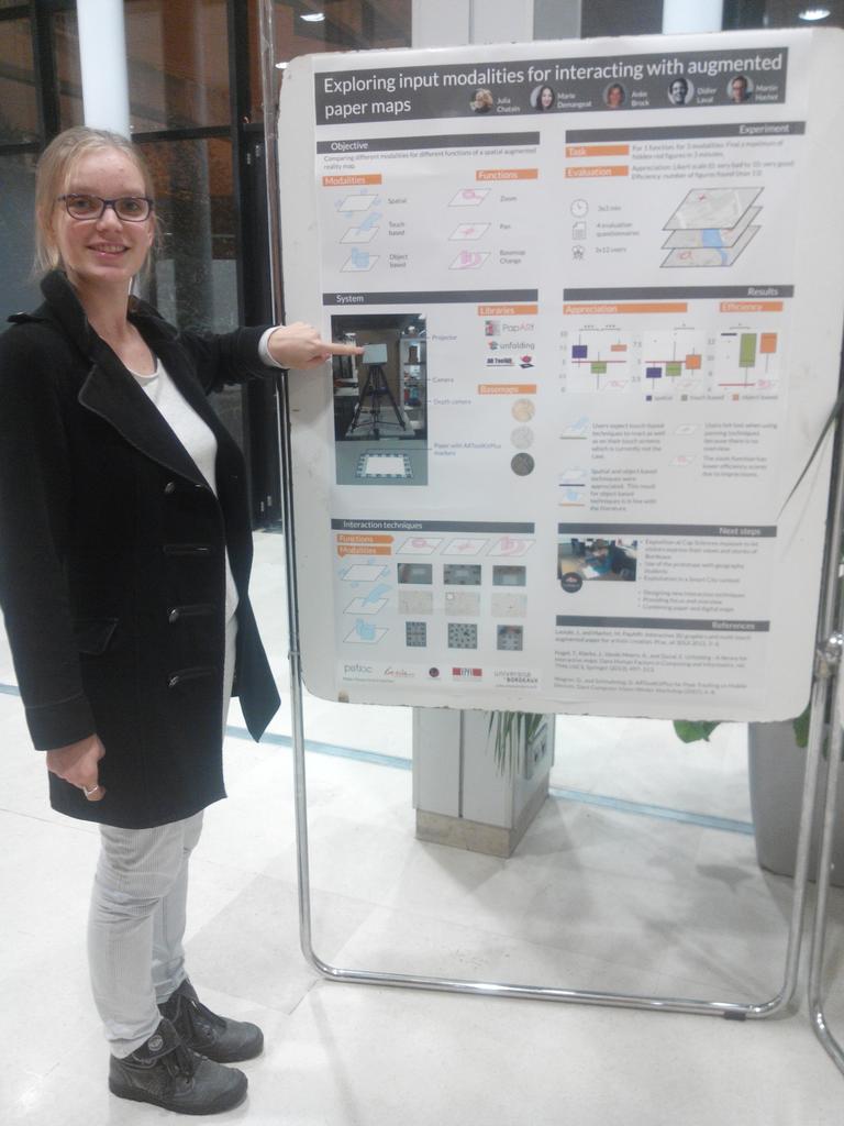 potioc_team's tweet photo. @IHM_15 @JuliaChatain presents her work about augmented reality maps @capsciences @Inria_Bordeaux @univbordeaux https://t.co/RL54181GOQ
