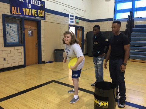 Kenwood HS SSA students help peers participate in the target games unit in PE!