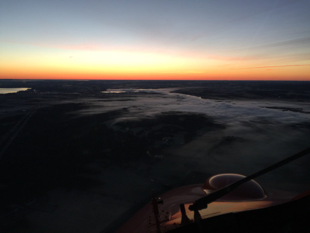 TA_Milne's tweet photo. A sunrise fog bank over the Madawaska river where it meets the Ottawa river at Arnprior. @ornge #niceofficeview https://t.co/e4FXN6pheX