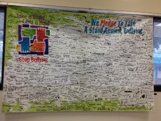 "We Pledge To Take A Stand Against Bullying" DLE students signed the banner and say "no" to drugs and bullying.