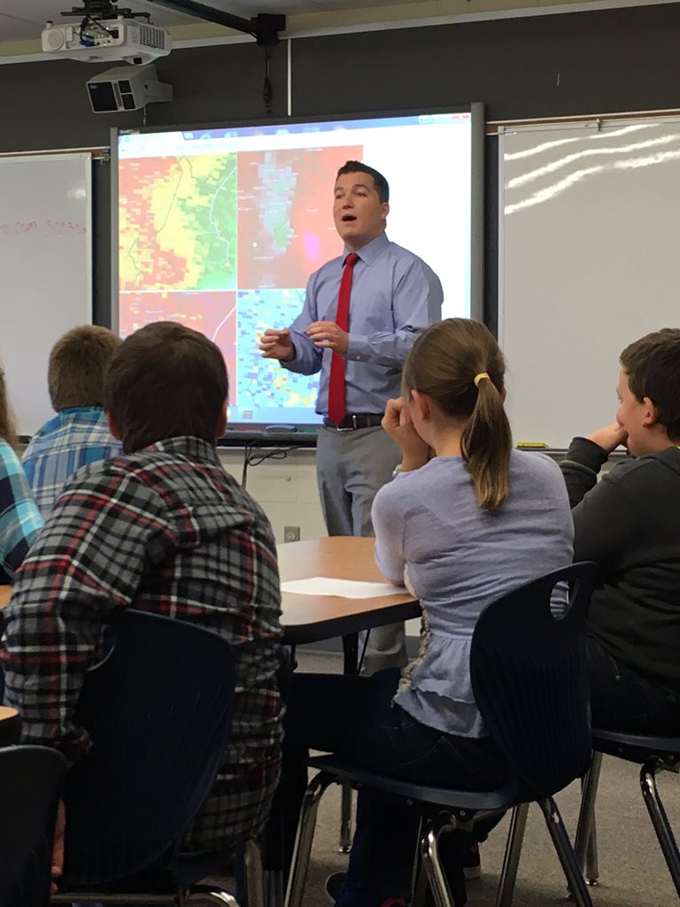 From today's visit at the Goshen Center School. Props to any wx geek who can identify the radar image behind me.