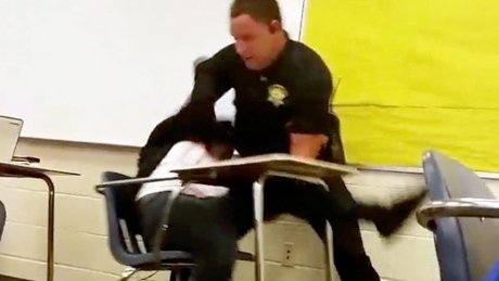 CBCNews's tweet photo. Officer who flipped student in desk to be let go, report says https://t.co/yRcQG35zXn https://t.co/LgXCbaDtjk