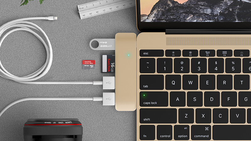 Gizmodo's tweet photo. This thin USB-C dock gives your new MacBook every port it's missing https://t.co/WF9ClSwwqX https://t.co/U39qJpA4I0