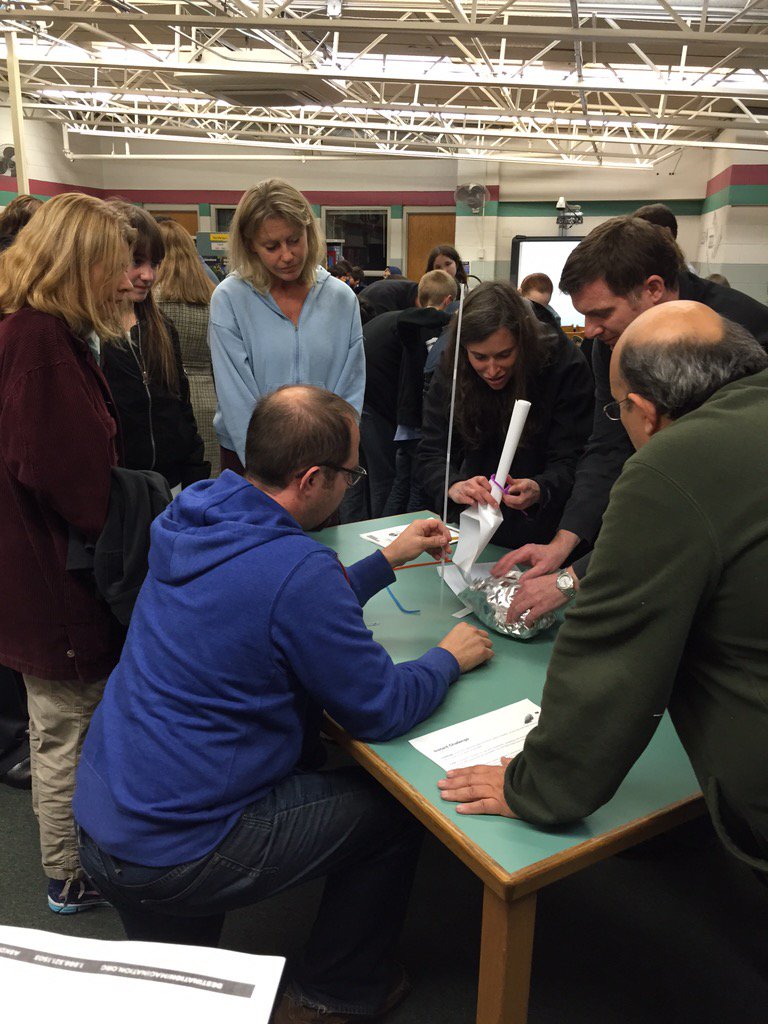 Wilmot parents try out an instant challenge at our DI parent night!! Great support for kiddos! #engage109 #wilmot109