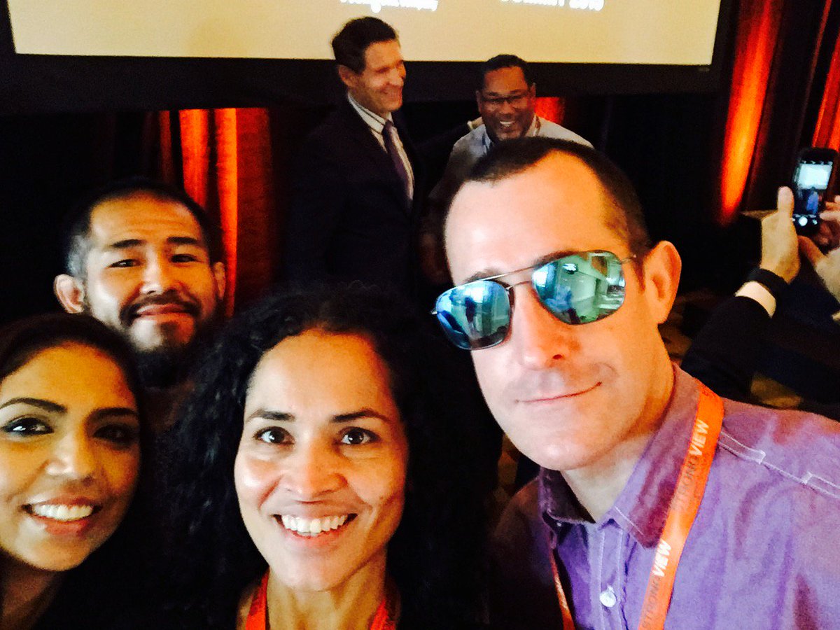 JudithSoto's tweet photo. Yep...that's Steve Young (ex-49ers star quarterback) in the background. Best photobomb selfie ever! #SVSummit15 https://t.co/pk5fYuBFom