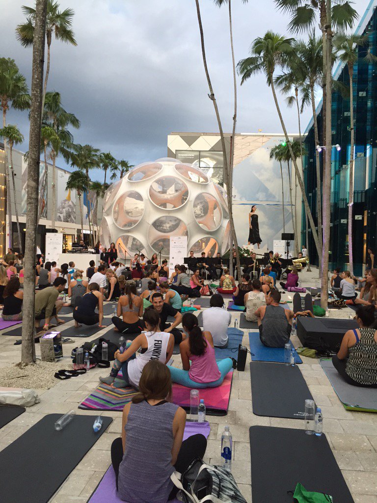 yogartevent's tweet photo. Reporting live! Yogis take over @miamidesigndistrict. #yogartevent https://t.co/EXmfRh4RlI