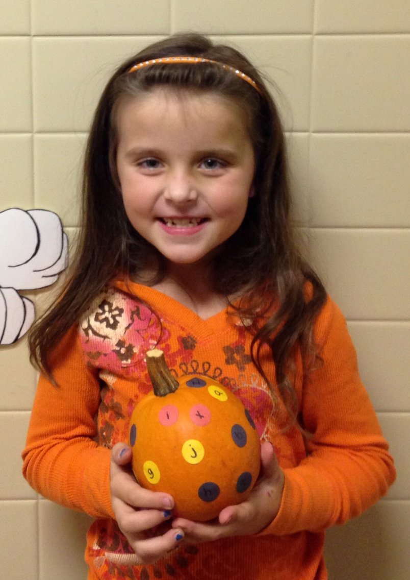 mrs_norland's tweet image. #apsdawson #apspride Homework rocks when you get to put letter stickers on your pumpkin. #chataps #alphabet