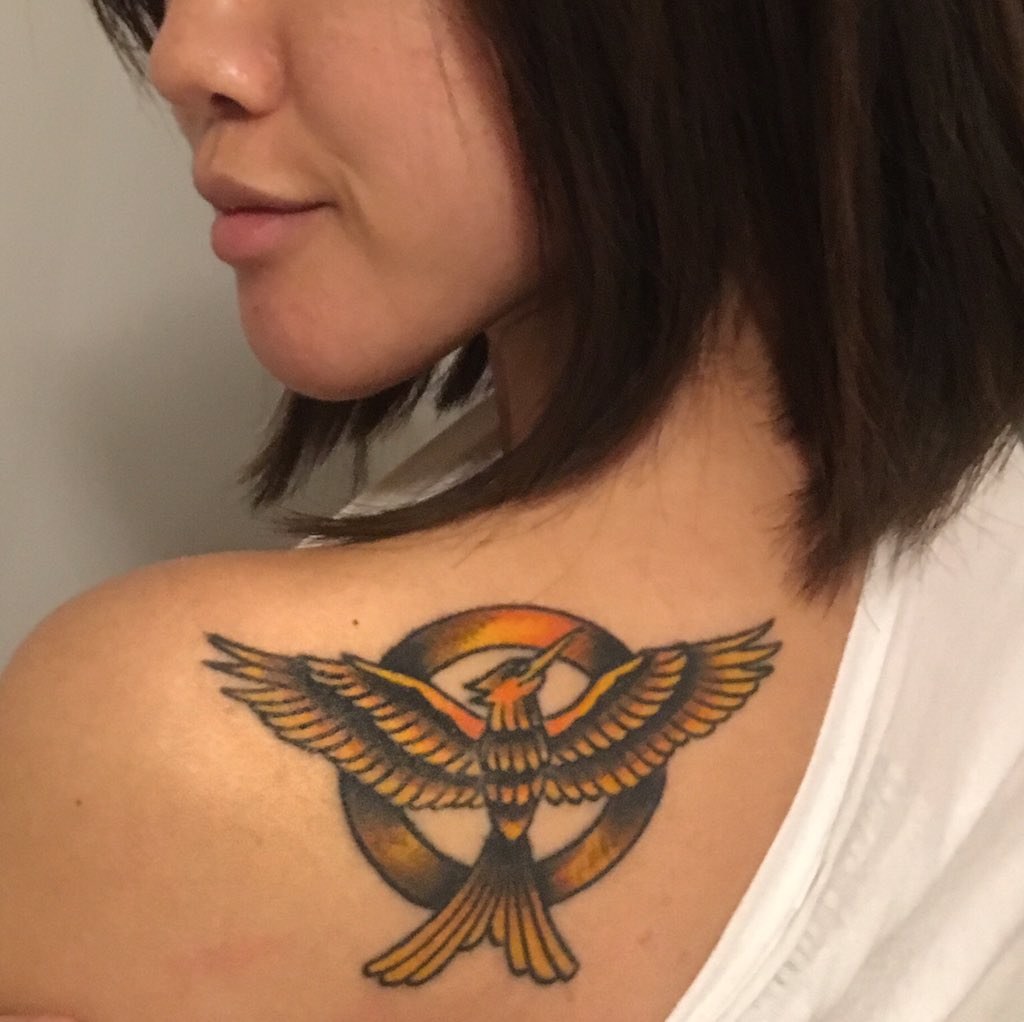 Revamp on this Hunger Games tattoo. Swipe to see the before. #literaryink |  Instagram