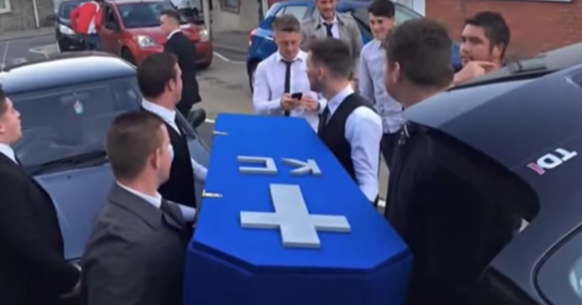 HuffPost's tweet photo. Men hold faux funeral after friend ditches them for girlfriend https://t.co/e7QzUQczS6 https://t.co/OIRfbhKF7L