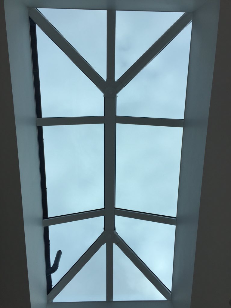 Impressive brick extension with brown uPVC patio doors and a stunning roof lantern. 
In #dagenham