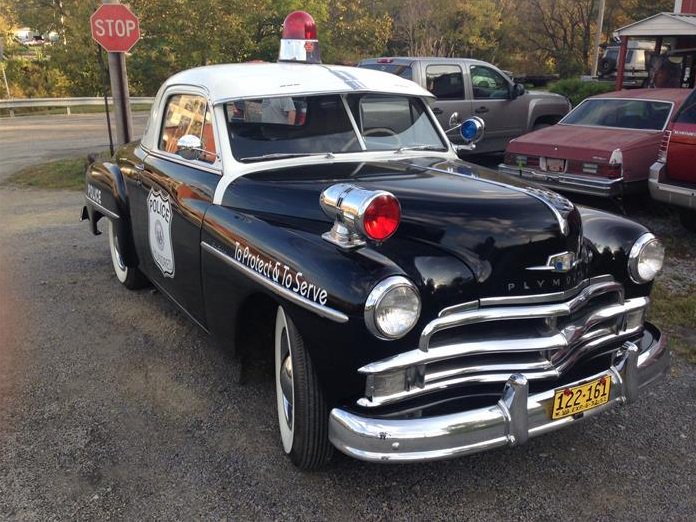 edmunds's tweet photo. #UsedCaroftheDay includes police uniform, handcuffs, billy club & original ticket book! https://t.co/SkwoOBQ1JG #tbt https://t.co/dzNU2Gu2vO