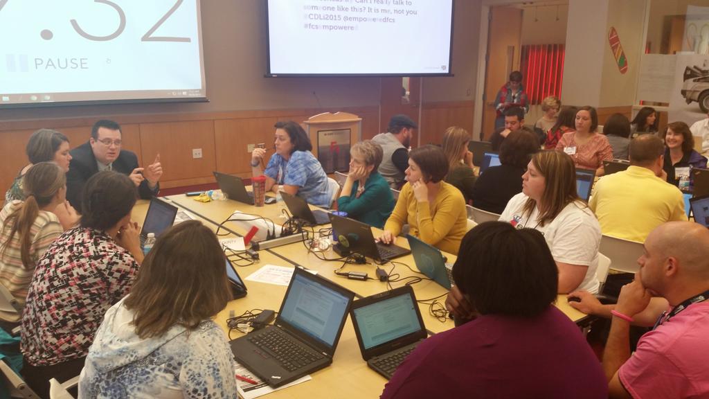 KBTchrTech's tweet photo. @FCSchoolsNC #empoweredFCS team talking it out. #CDLi2015 https://t.co/a0PZagb4Bf