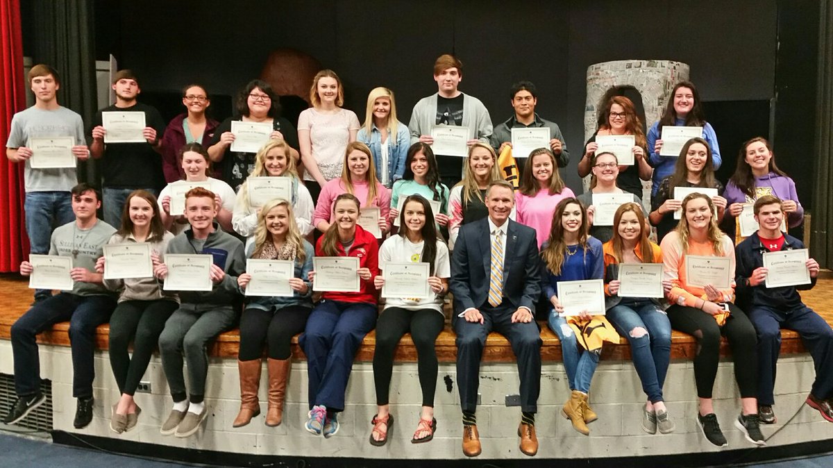 ETSUPrez's tweet photo. Honored to present @ETSU Certificates of Admission Acceptance to Sullivan East High School students. @patriotslive https://t.co/FF9E0QYaK8