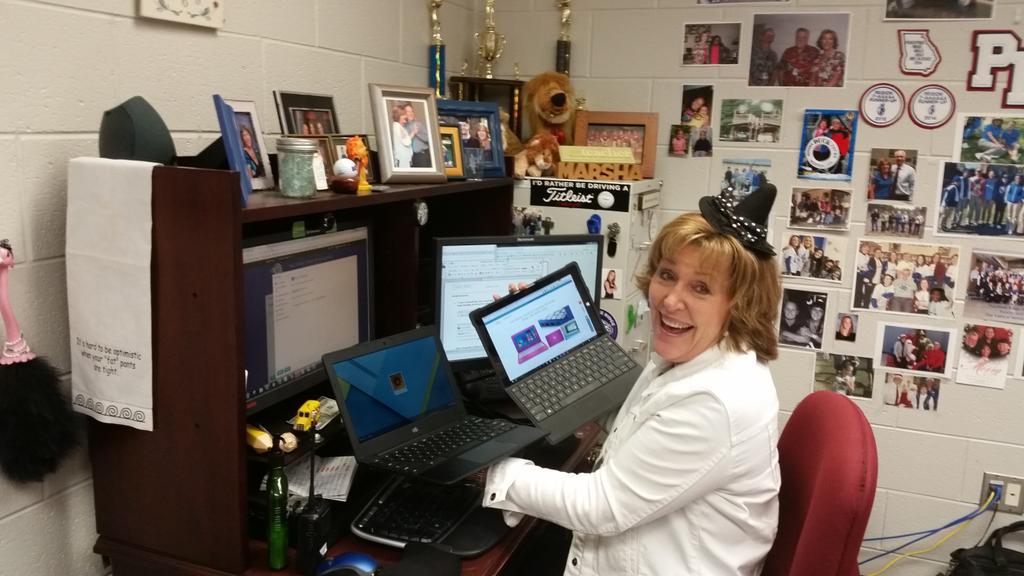 PRHS_LIBRARY's tweet photo. Our LSTC wears many hats! Here she is celebrating Halloween by researching the best devices to buy with grant money https://t.co/pEeNiWaRgV