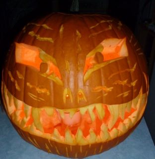 My pumpkin rules. It must be a face, no stencils, the eyes and mouth need to have an emotion, but these can differ