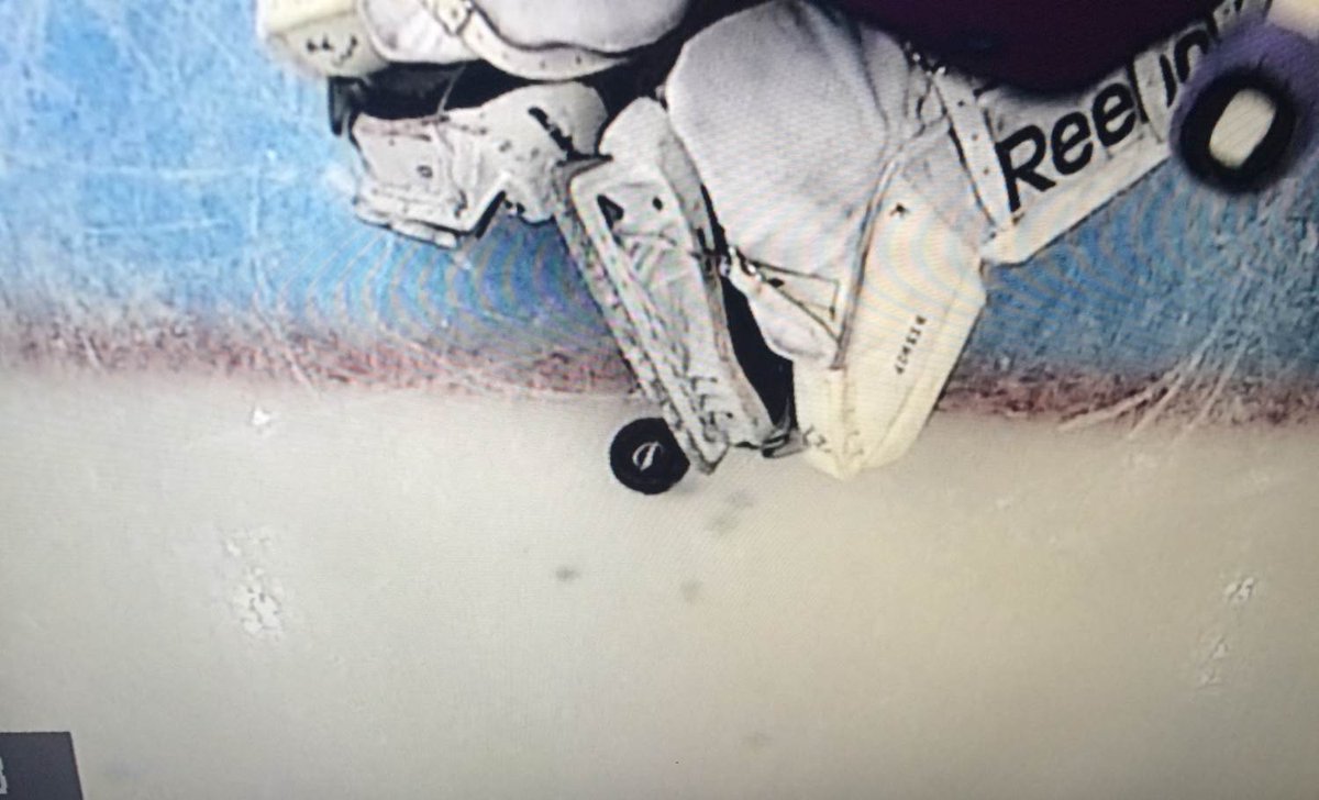 NHLPR's tweet image. The in-net cam shows the puck shot by @Avalanche forward Alex Tanguay completely crossed the TBL goal line #COLvsTBL