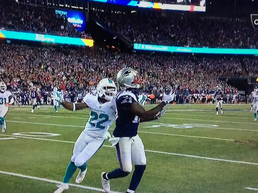 NHLHell's tweet image. Hit in the face mask and then held by the white glove. No PI call #2 of the night. #PatriotsDolphins #nfl #badref