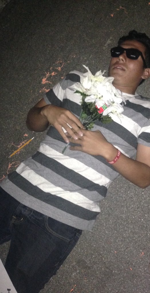 jazzy_marie143's tweet photo. Walk outside and someone is laying in the middle of the street dead😨😰....but it's just my hoco date 😂🍃🎃 #hocow/Liz https://t.co/OWJpveyQ4p