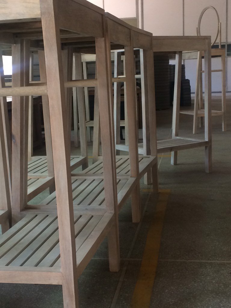 Capsbury's tweet image. A sea of elegant &amp;amp; refined standing dressers by @CLAitken in production 4 @aramstore #india #craft #furnituredesign