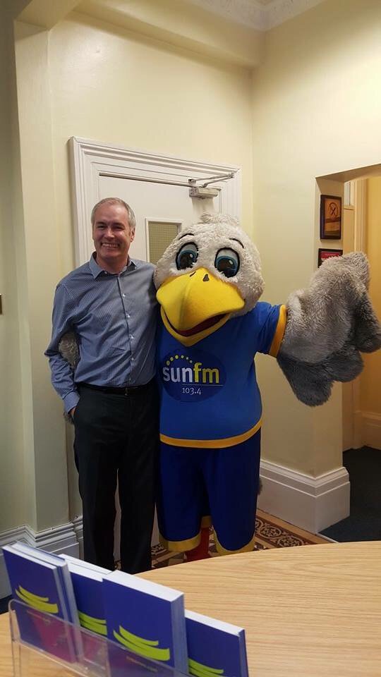 ttrbarnes's tweet photo. This morning we welcomed Sunny the Seagull and the Sun FM Street Team into the office. Bringing goodies and biscuits https://t.co/cdVZc9yx9K