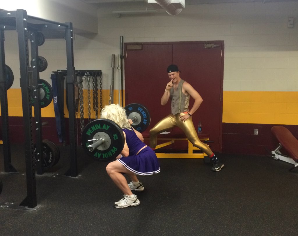 CobberBaseball's tweet photo. @TannerKluis (cheerleader) and @TStorm26 (?) are getting after it today for the Halloween lift https://t.co/Xs7ohSqhVX