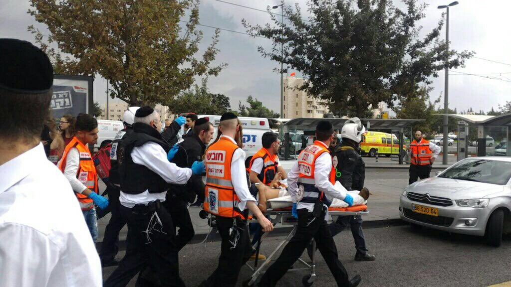 UnitedHatzalah's tweet photo. United Hatzalah volunteers treating injured at terror attack at Ammunition Hill this Friday afternoon Jerusalem. https://t.co/YEXSgObQ34