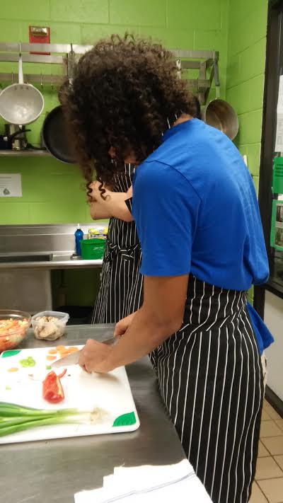 WeBuildSuccess's tweet photo. Guest speaker in Culinary Arts from the Culinary Institute of America and Cory Clements practicing his skills https://t.co/sPfHMDfVsE