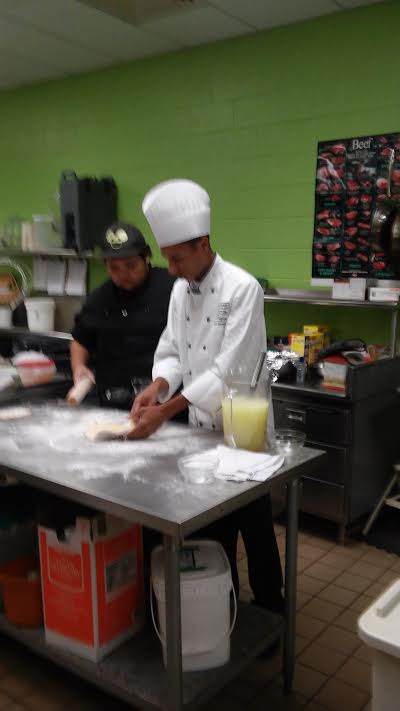 WeBuildSuccess's tweet photo. Guest speaker in Culinary Arts from the Culinary Institute of America and Cory Clements practicing his skills https://t.co/sPfHMDfVsE