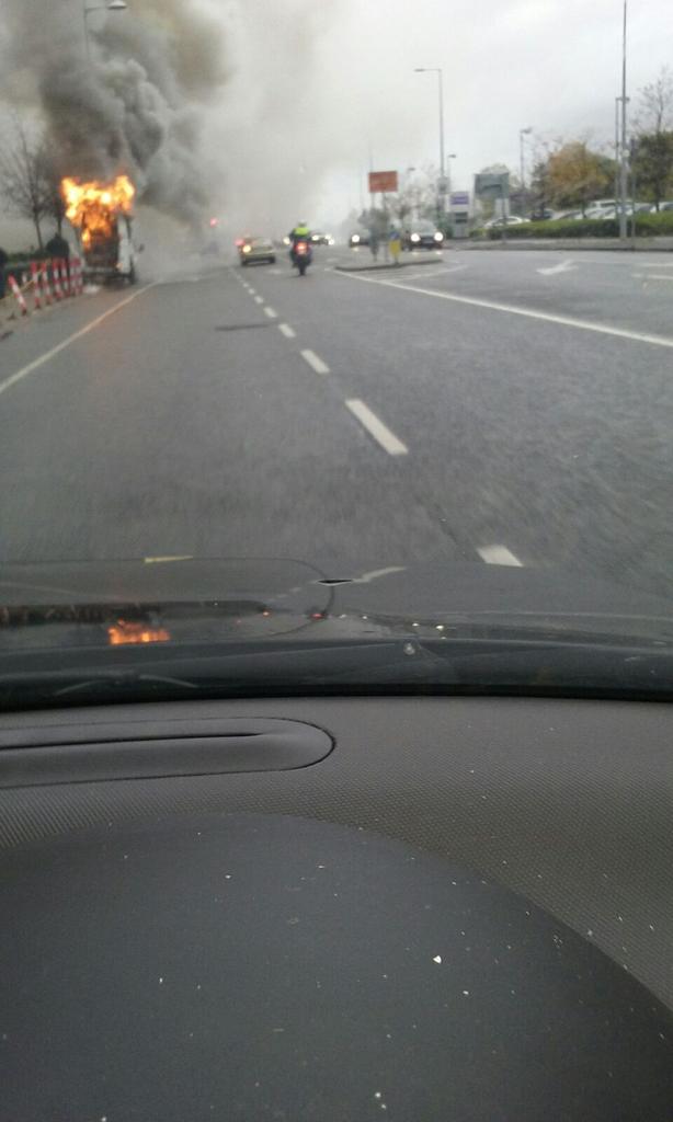MchaleJonathan's tweet photo. Van on fire outside Aldi in Sandyford https://t.co/PNmxPFp61Q