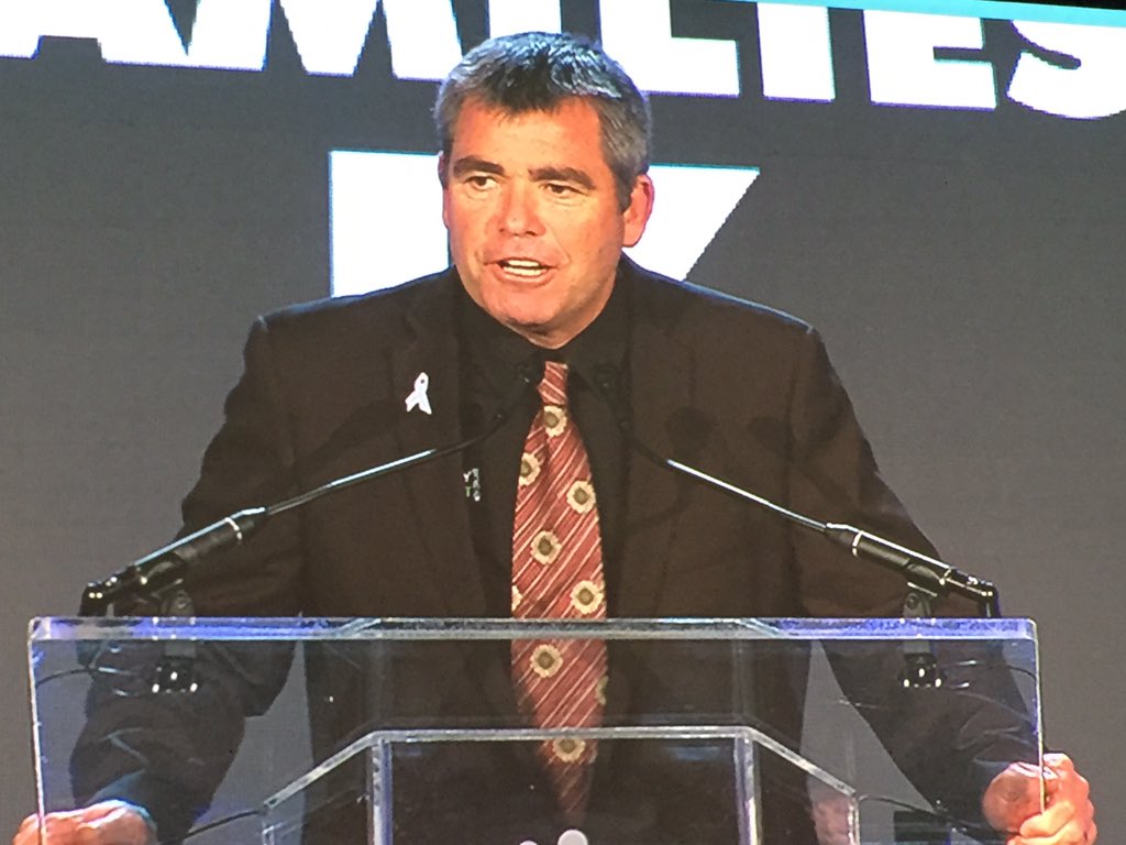 LyleShelton's tweet image. Oh dear, who let him on? Wearing black, he hi-jacks #wcf9 to spruik the All Blacks. Bewildered Americans everywhere.