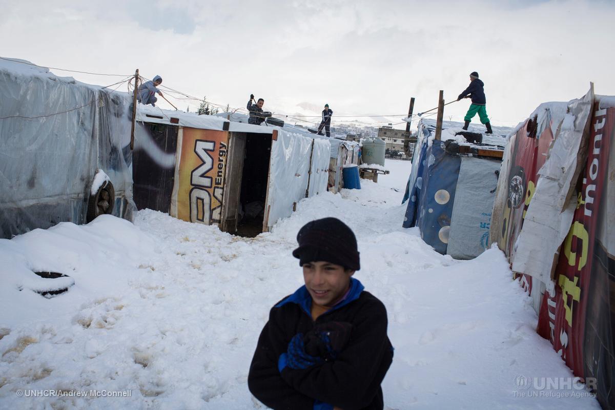 Refugees's tweet photo. As winter bites for Syrians in exile, the war at home digs deeper https://t.co/vIErnOdCta https://t.co/8ePVoZeidh