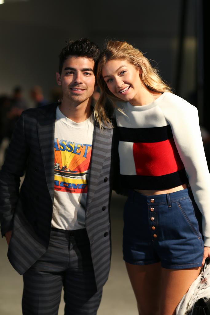 TommyHilfiger's tweet photo. Spotted: The iconic @GigiHadid with @JoeJonas in a #MyTheresaXTommy collection crop sweater. https://t.co/Z1cGxACdMW