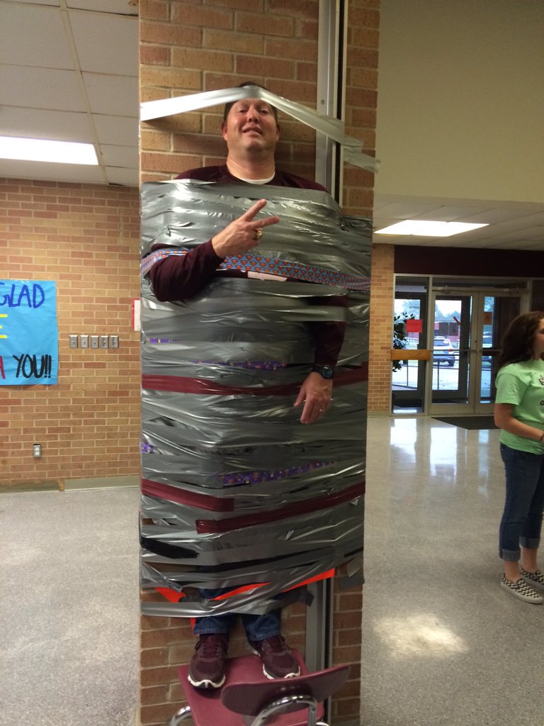 Mr. Martindale is officially duct taped to the wall!!! #goodsport #awesomeprincipal