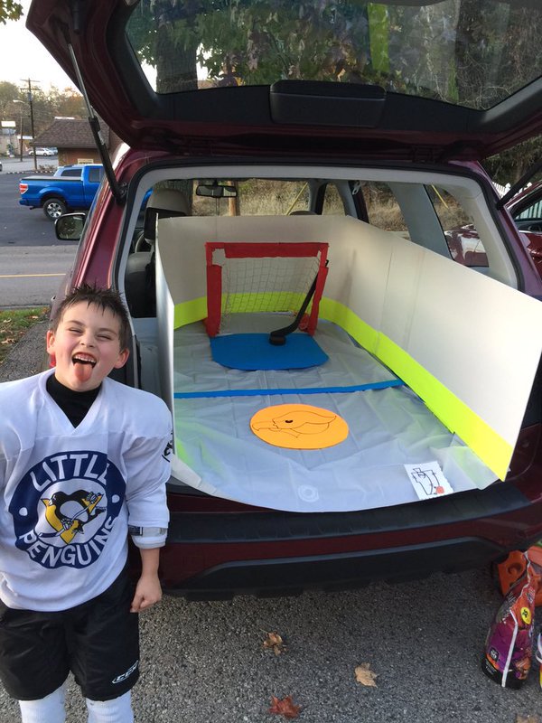 NHL's tweet photo. Hockey fans are pretty clever with costumes. Didn't share yours yet? Tweet #HockeyHalloween. https://t.co/4na51owsIt https://t.co/fwlcblUxaP