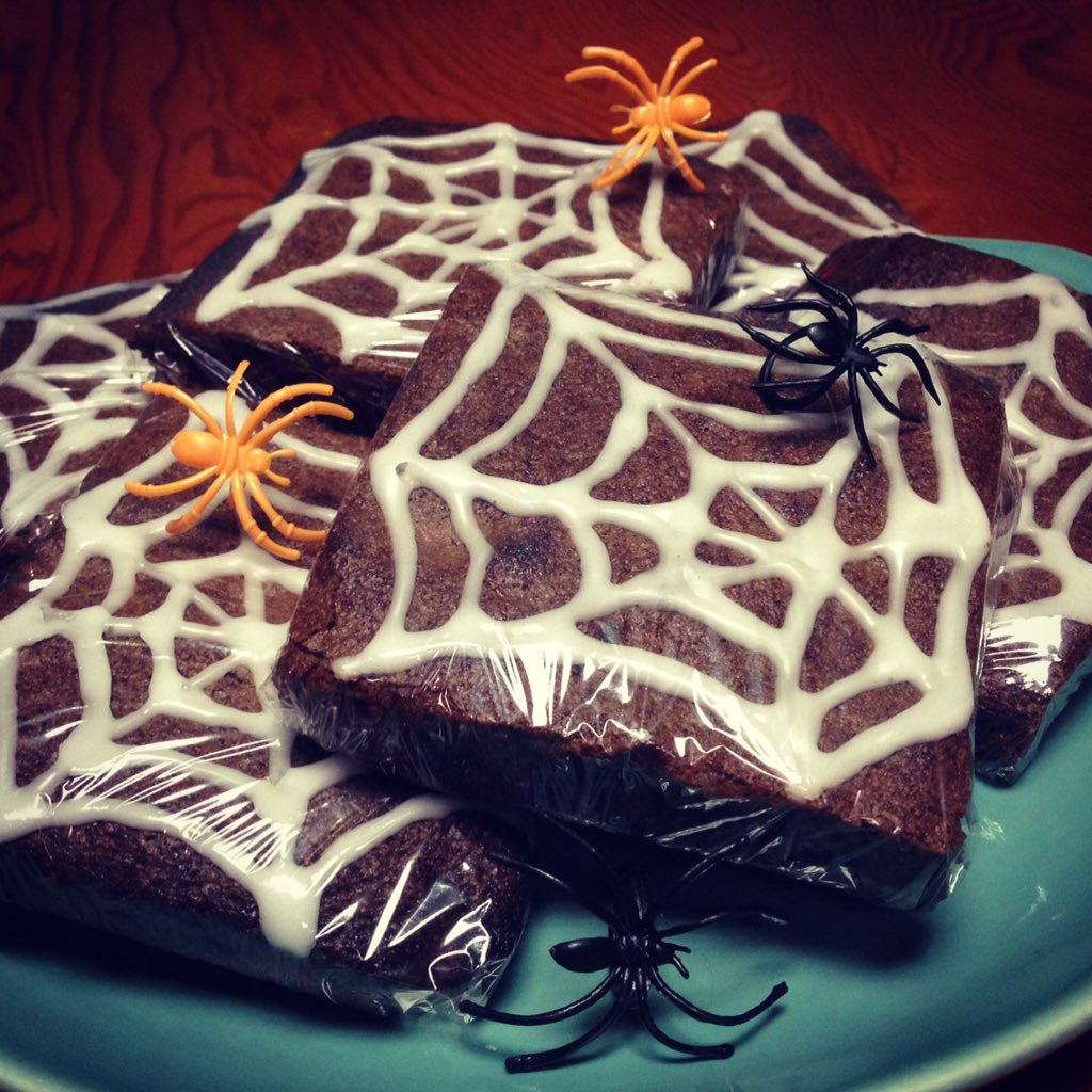 anniemoons's tweet photo. Spooky spiderweb brownies. They seem to have attracted some brownie recluses #halloween https://t.co/eU3kFXMpBQ