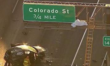 GetInsideWTF's tweet photo. A man's body catapulted from his car and landed atop the 5 Freeway sign. https://t.co/76X3CKtccf #news https://t.co/swT2YselMI