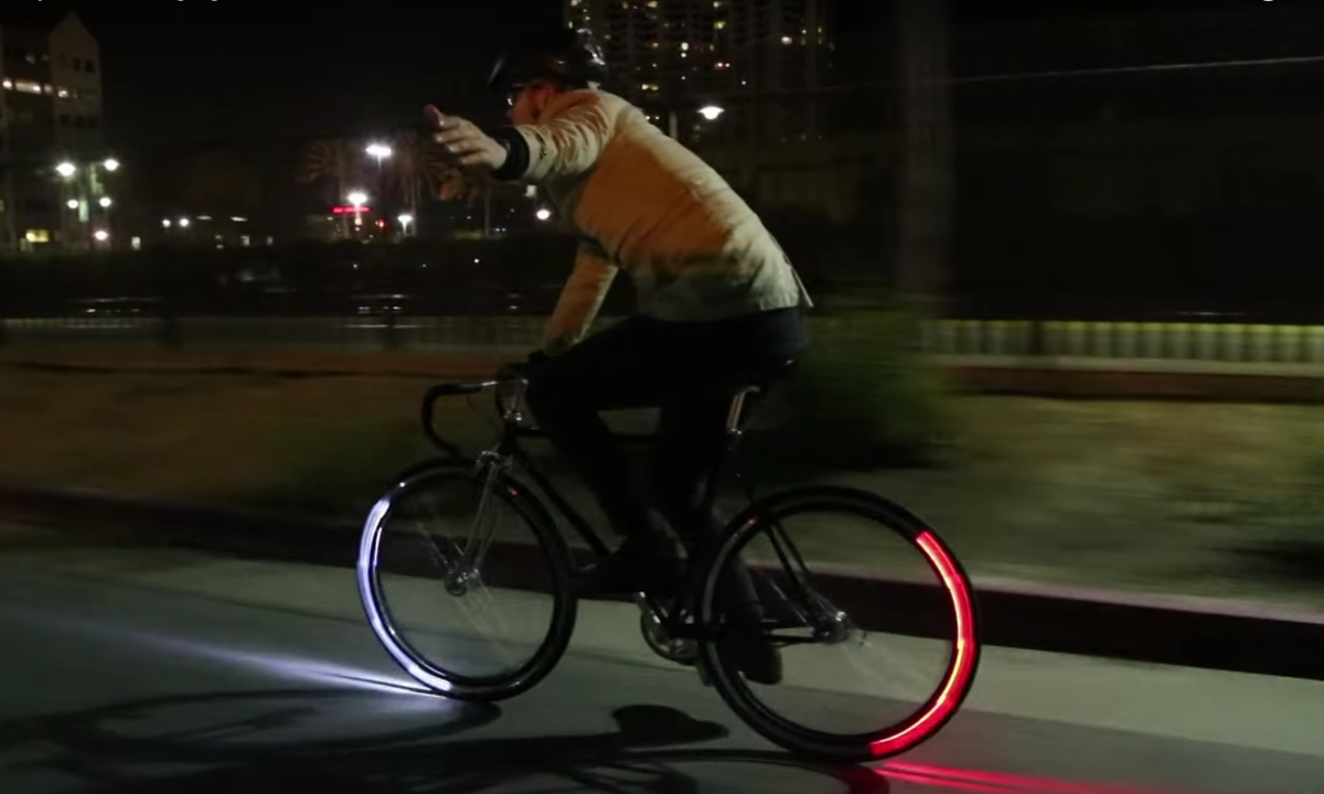CES's tweet photo. These @revolights use Bluetooth to turn your bike wheels into turn signals https://t.co/rpJDpZhmR5 https://t.co/NXGHQADRal