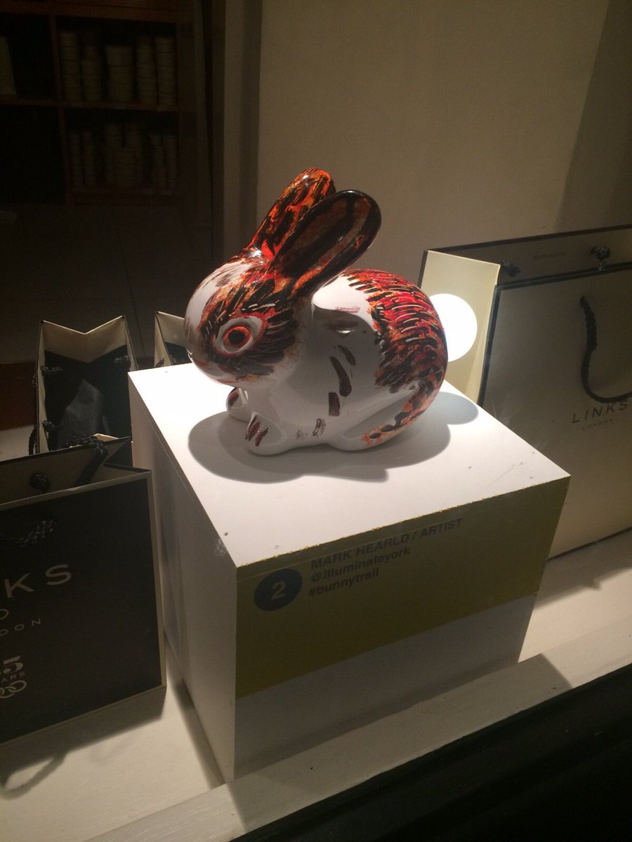 fionacpearson's tweet photo. #bunnytrail in shop windows @IlluminateYork. Local artist #MarkHearld's painted bunny #IY2015 https://t.co/fijF0zfnwY