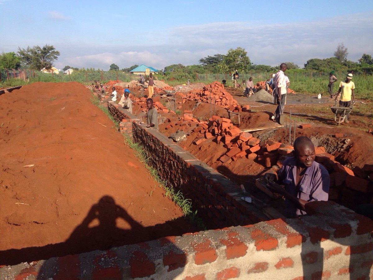 Rain or shine, construction continues at Global Leadership Academy!